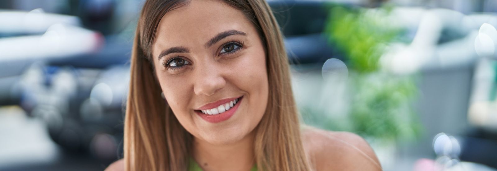 Young beautiful Hispanic woman smiling